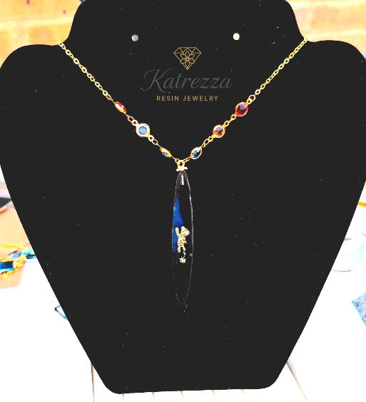 Bear Hugs & Blue Skies – Golden Teddy Resin Necklace