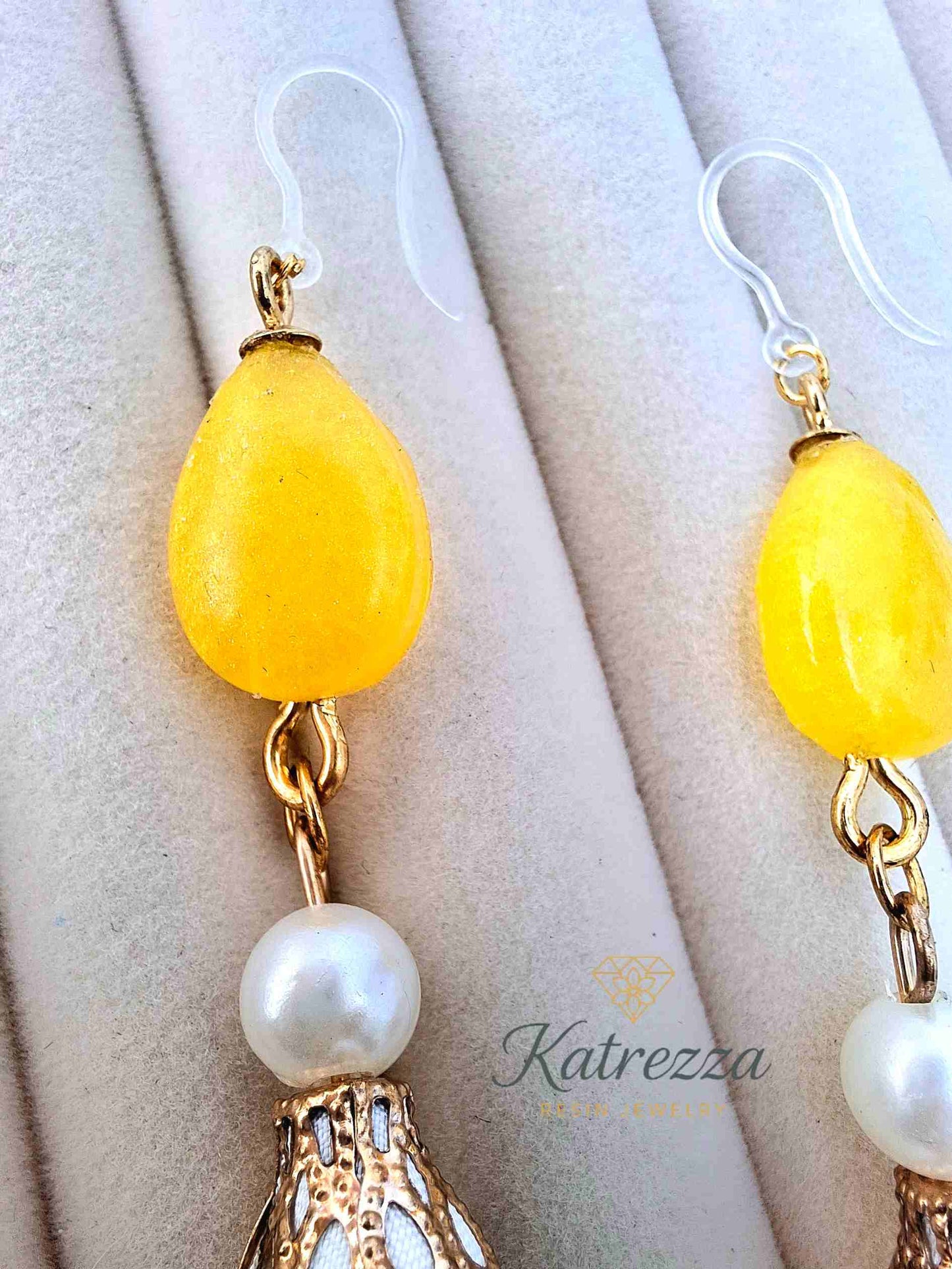 "Detailed close-up of bright yellow resin drop earrings with pearl accents – Katrezza Resin Jewelry"