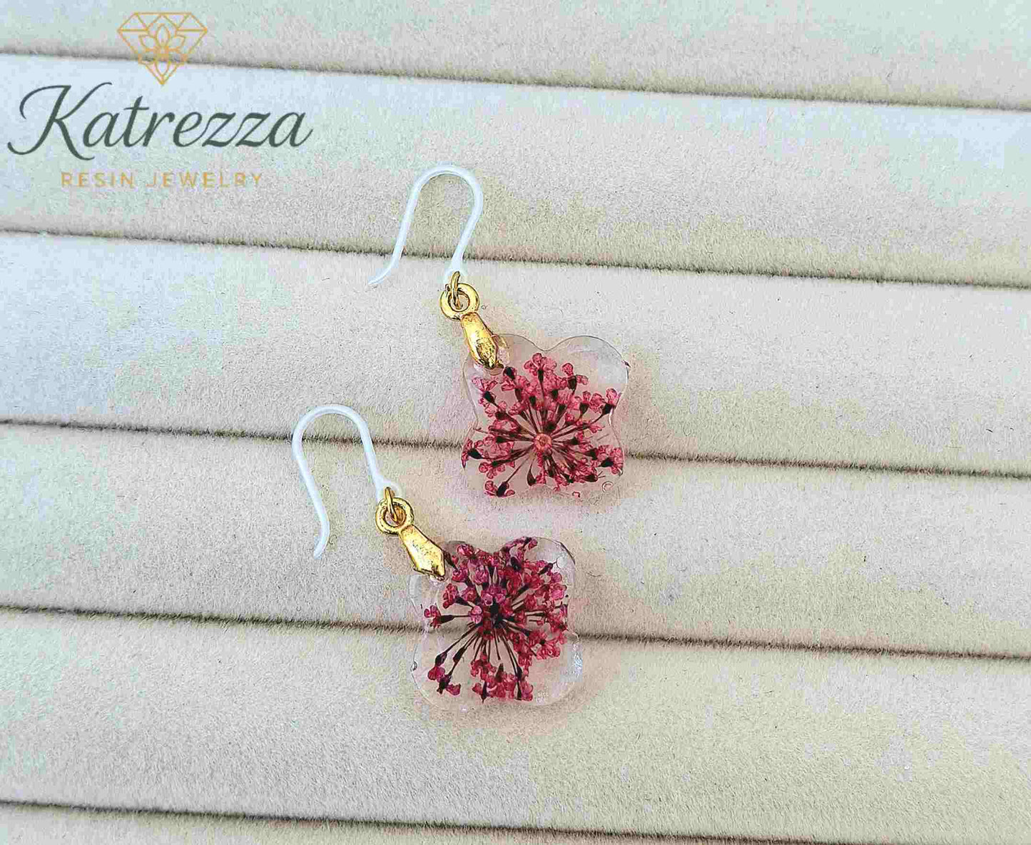 Hypoallergenic resin earrings with pink blossoms and silicone hooks