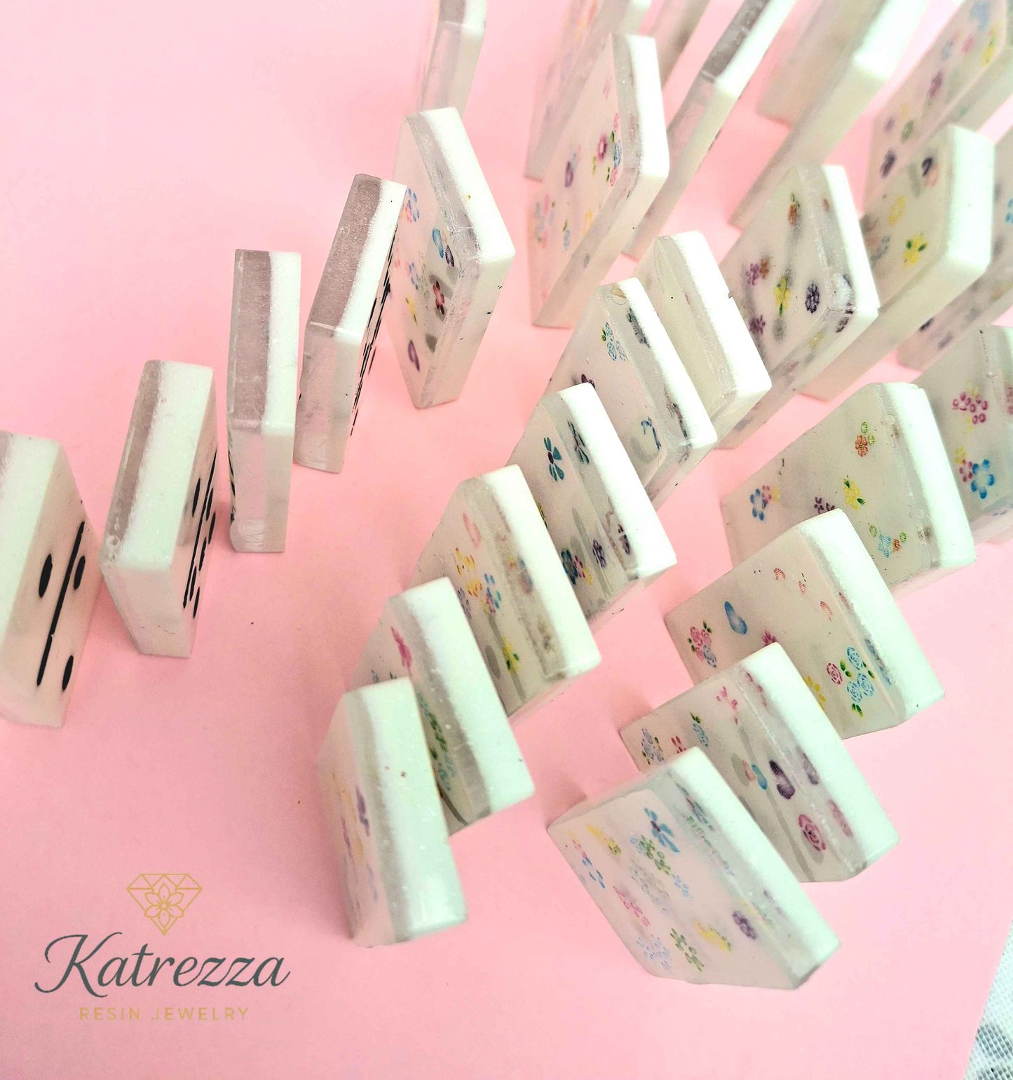 Classic white resin dominoes with traditional black dots