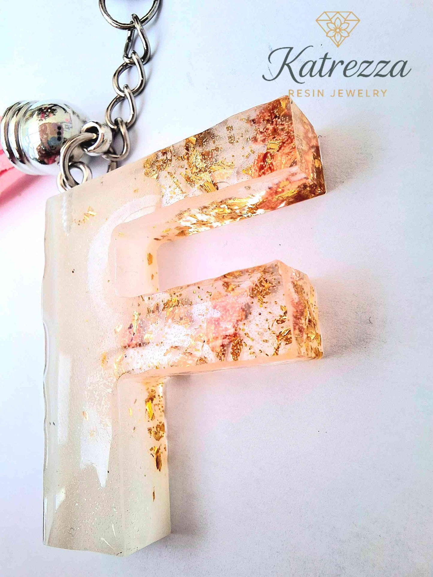 Handmade Resin Initial Keychain – Letter "F" with Gold Flakes & Pink Tassel