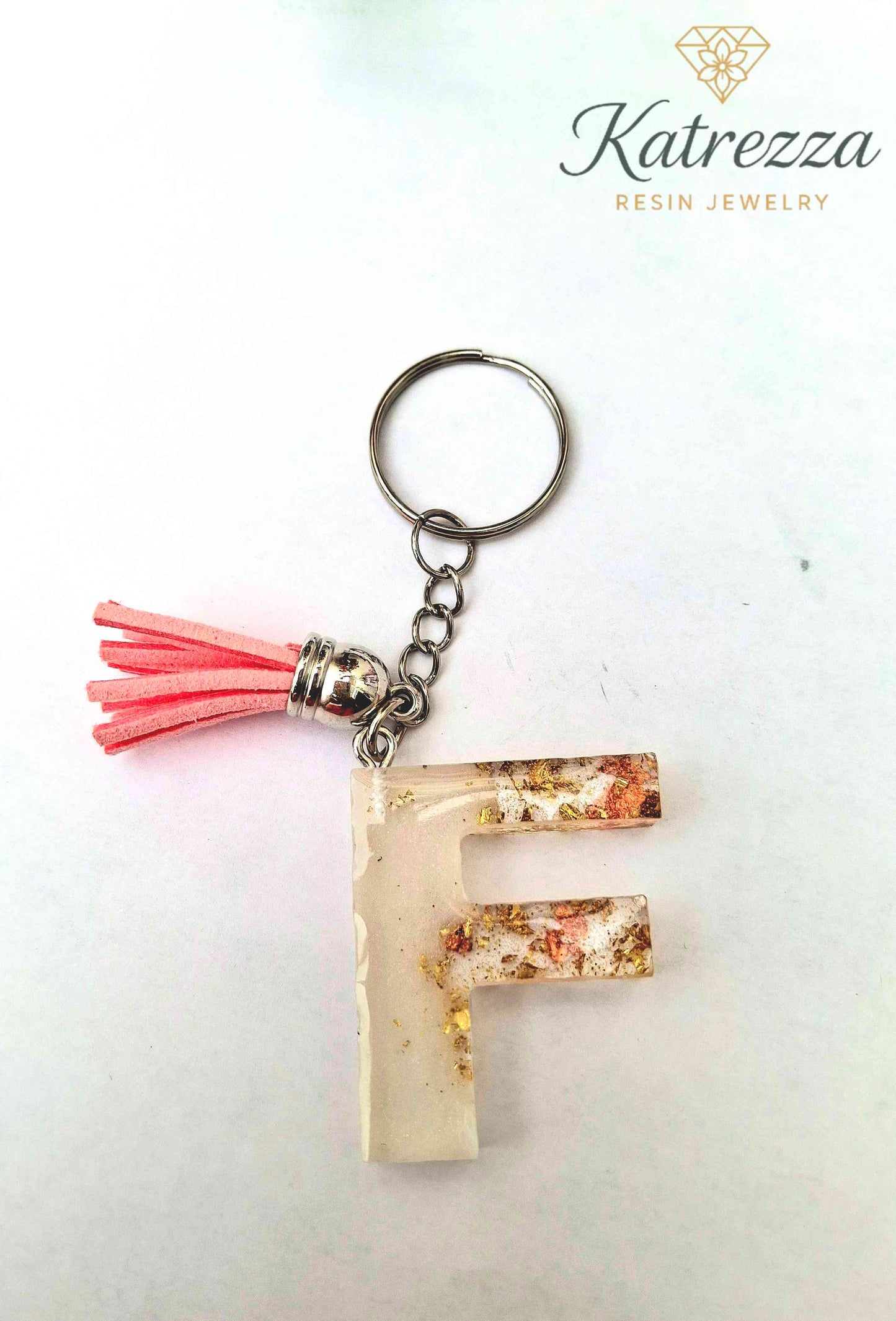 Handmade Resin Initial Keychain – Letter "F" with Gold Flakes & Pink Tassel