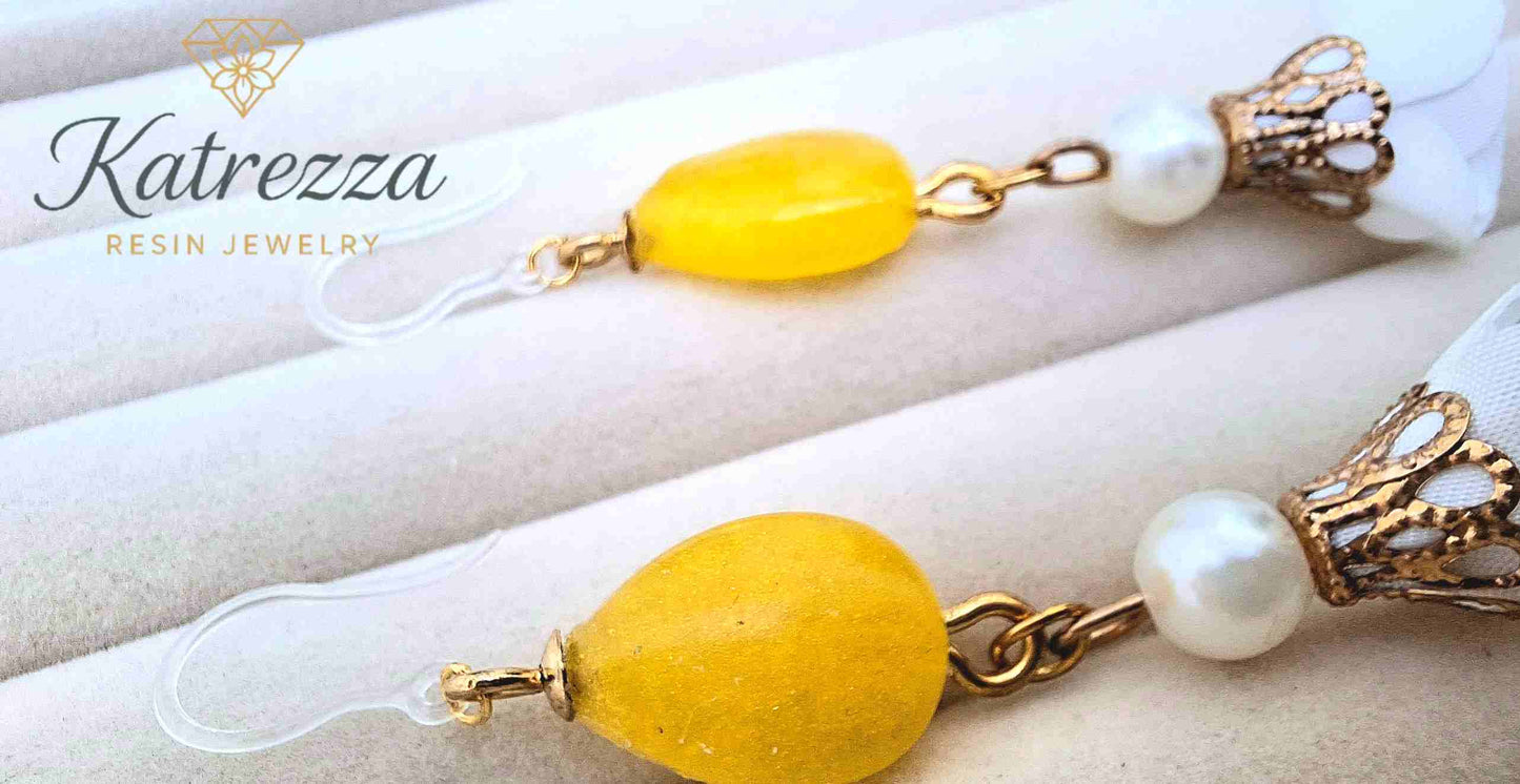 Elegant yellow resin drop earrings with pearl bead and white fabric flower charm – Katrezza Resin Jewelry"