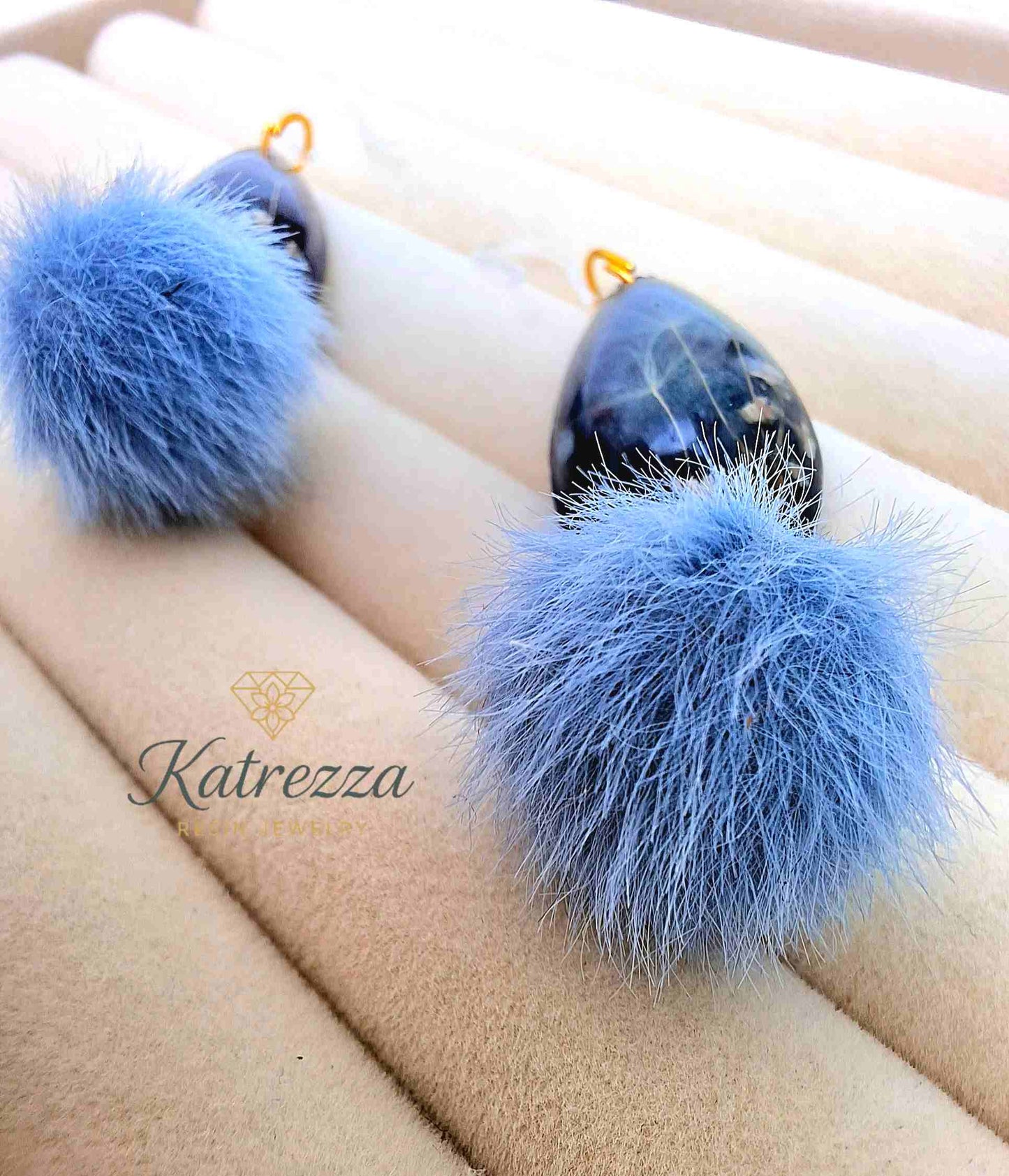 "Handmade teardrop resin earrings with glittery grey-black resin, real flowers, dandelion seeds, and fluffy blue pom-poms – Katrezza Jewelry"