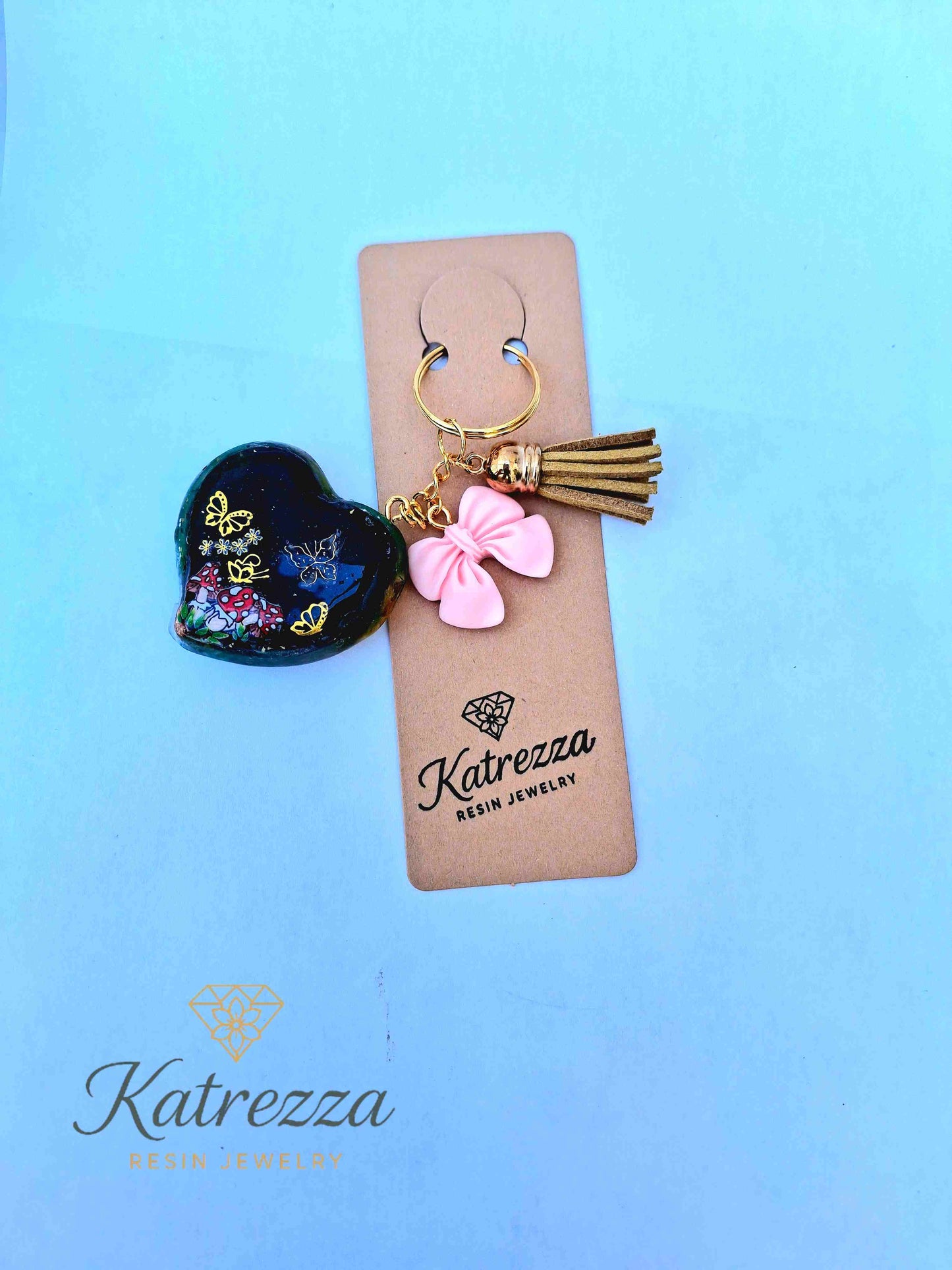 "Unique resin heart keychain with pink bow, gold tassel and natural imperfections – Katrezza Jewelry"