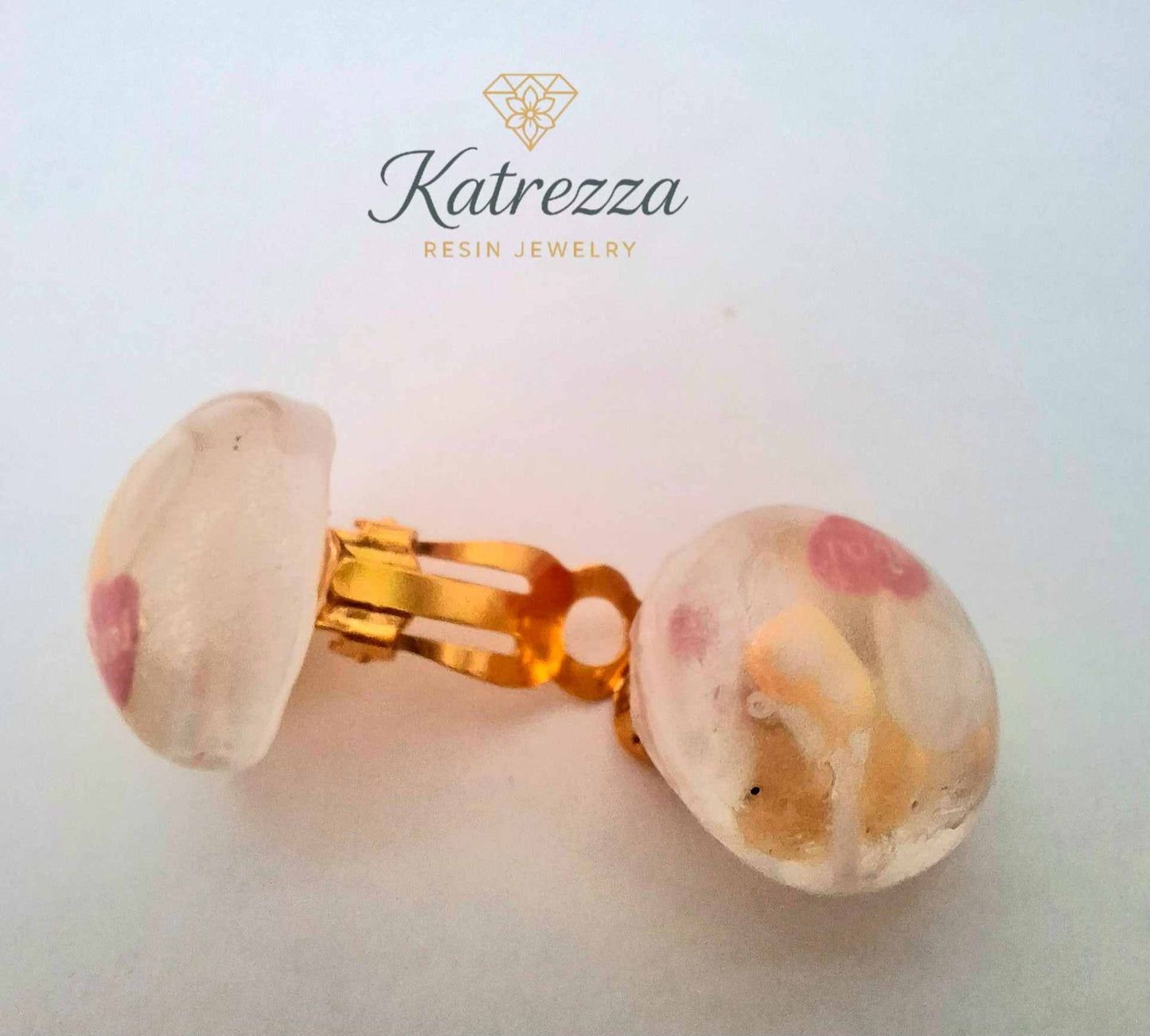 “Set of handmade resin clip-on earrings for kids – Katrezza packaging with fun designs.”