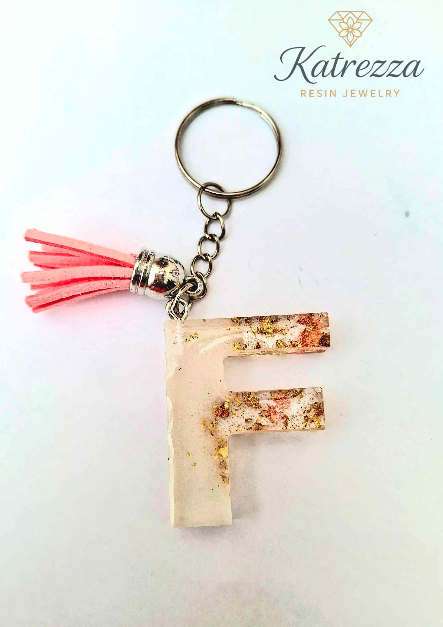Handmade Resin Initial Keychain – Letter "F" with Gold Flakes & Pink Tassel