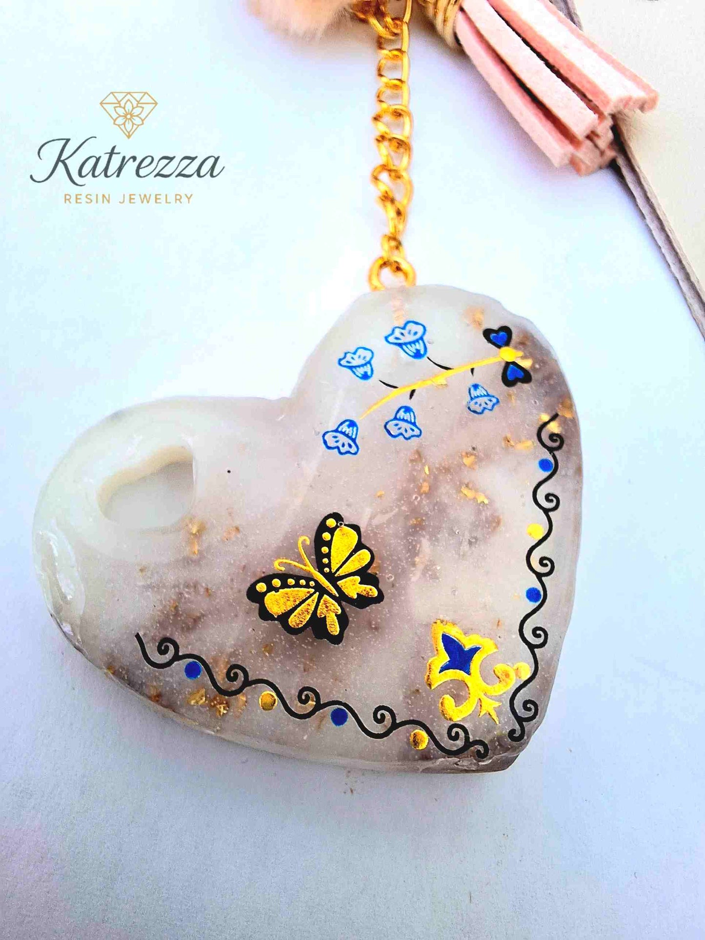 "Full handmade resin heart keychain with gold hardware, tassel and pompom – Katrezza Luxurious Collection"