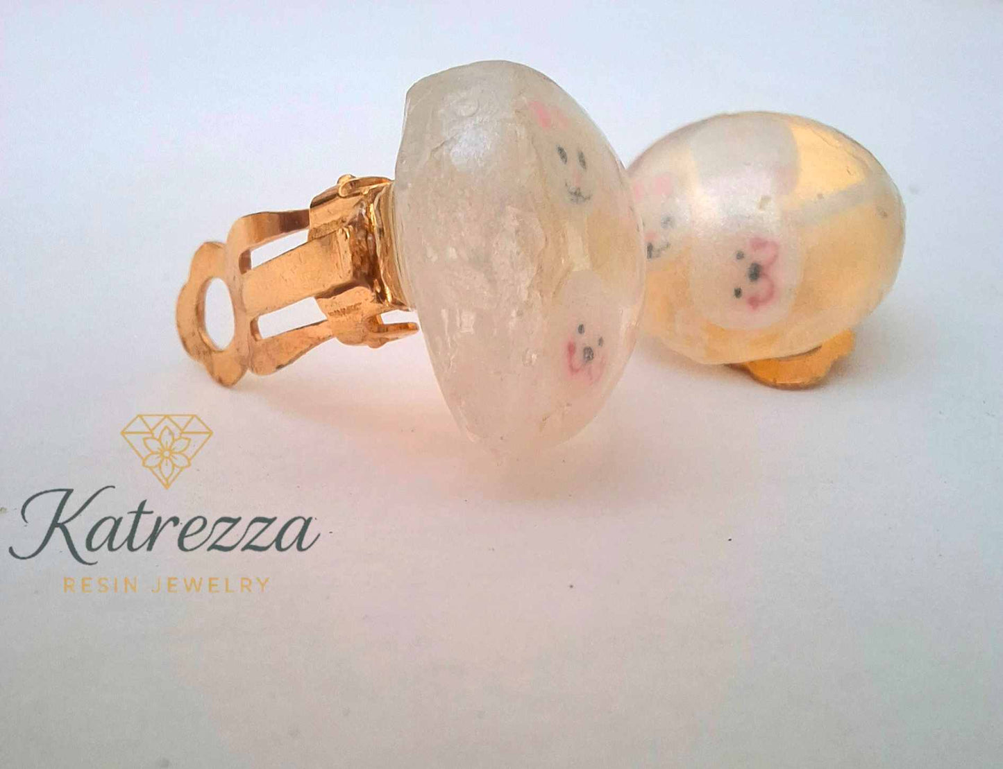 “Fun kids resin clip-on earrings with smiling bear faces – Katrezza handmade jewellery.”