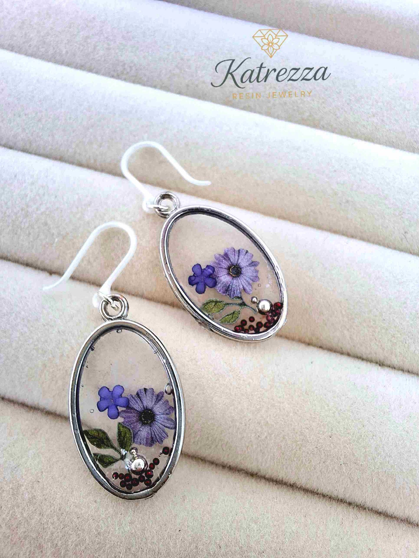 "Handmade 2cm oval resin earrings for girls with real purple flowers, silver-tone frame, and safe silicone hooks – Katrezza Jewelry"