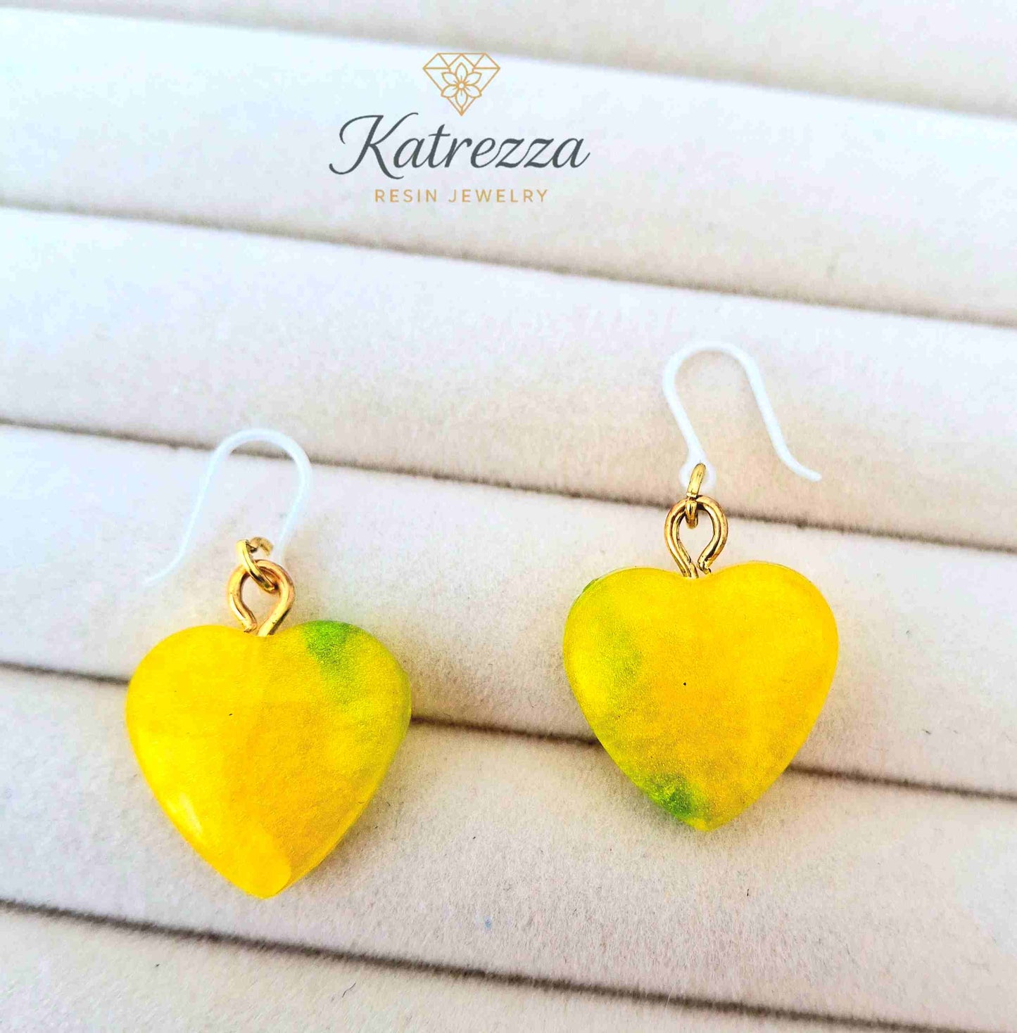 "Close-up of yellow heart resin earrings for girls with safe silicone hypoallergenic hooks – Katrezza Jewelry"