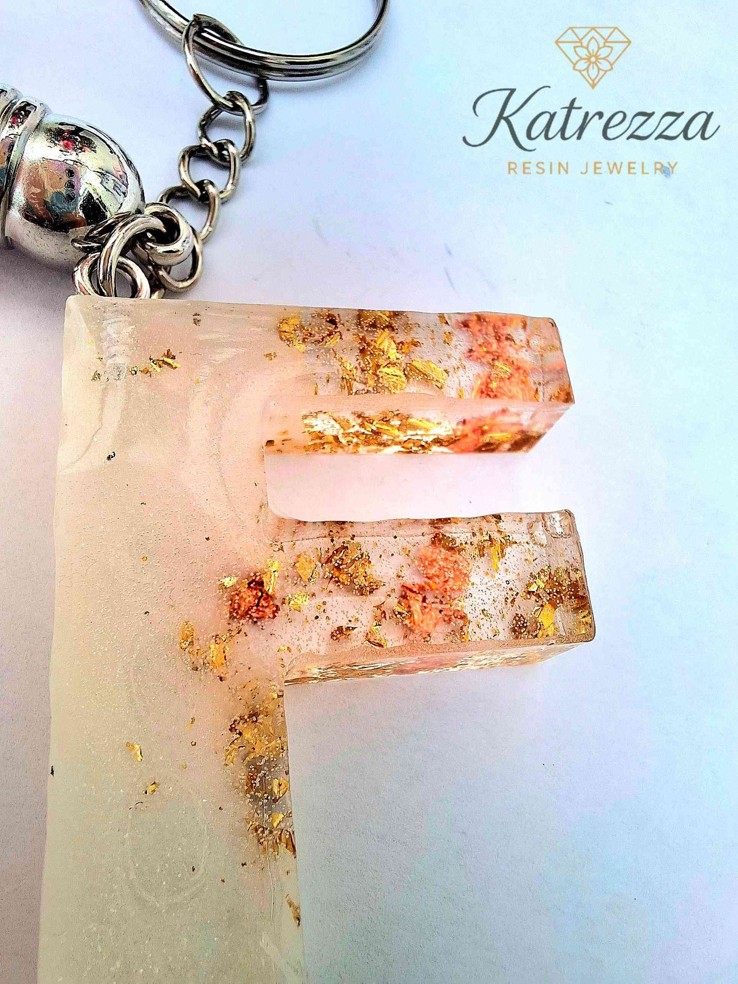 Handmade Resin Initial Keychain – Letter "F" with Gold Flakes & Pink Tassel