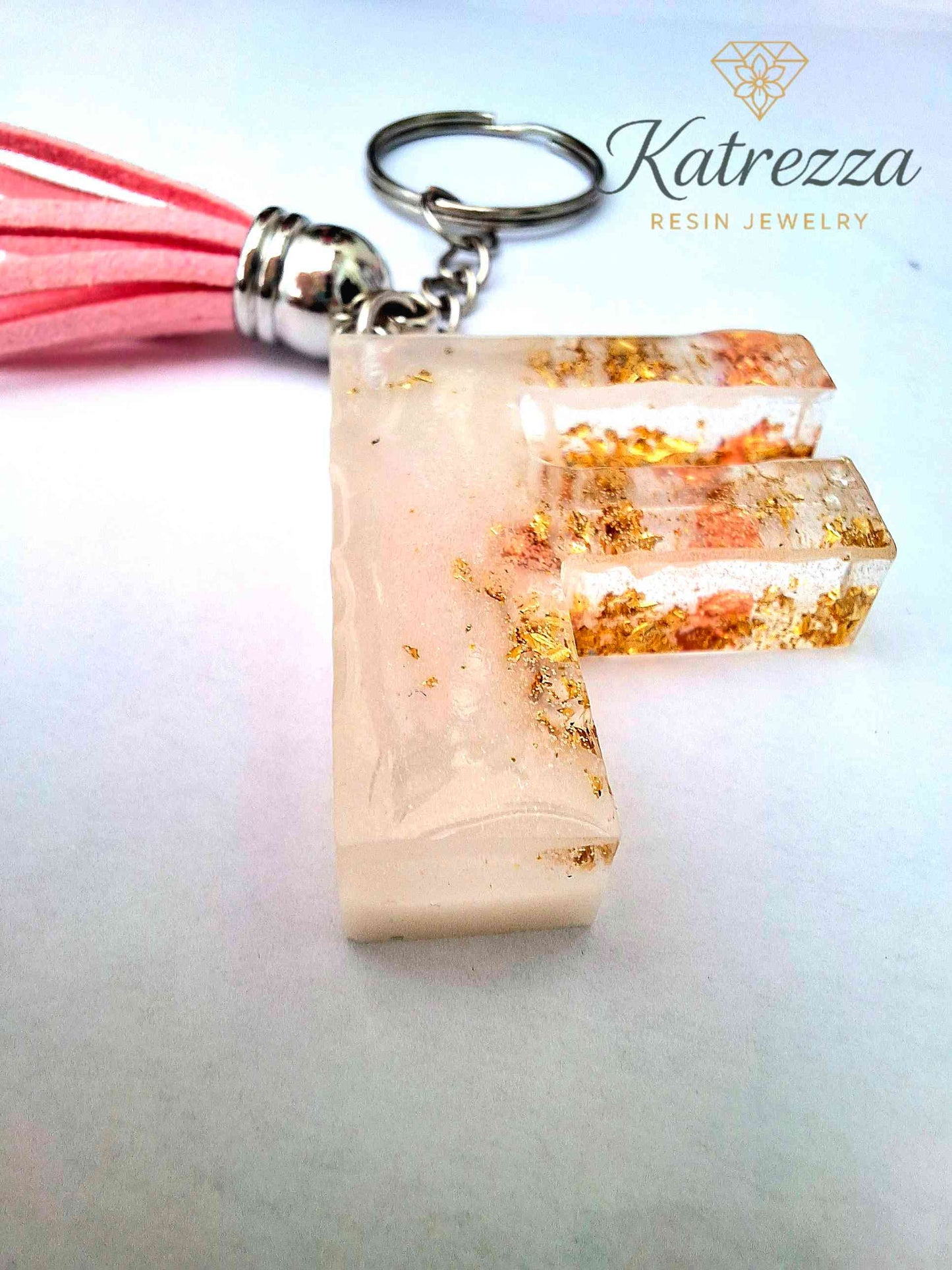 Handmade Resin Initial Keychain – Letter "F" with Gold Flakes & Pink Tassel