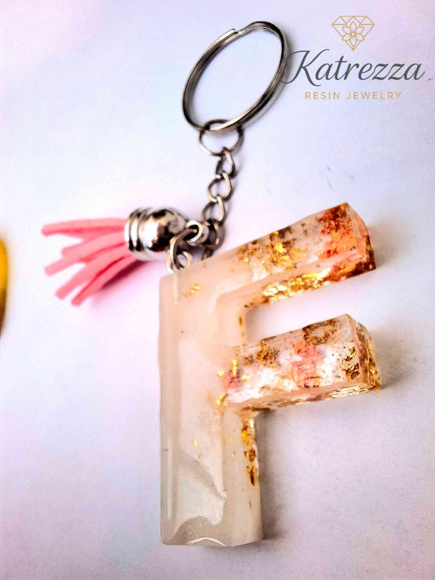 Handmade Resin Initial Keychain – Letter "F" with Gold Flakes & Pink Tassel