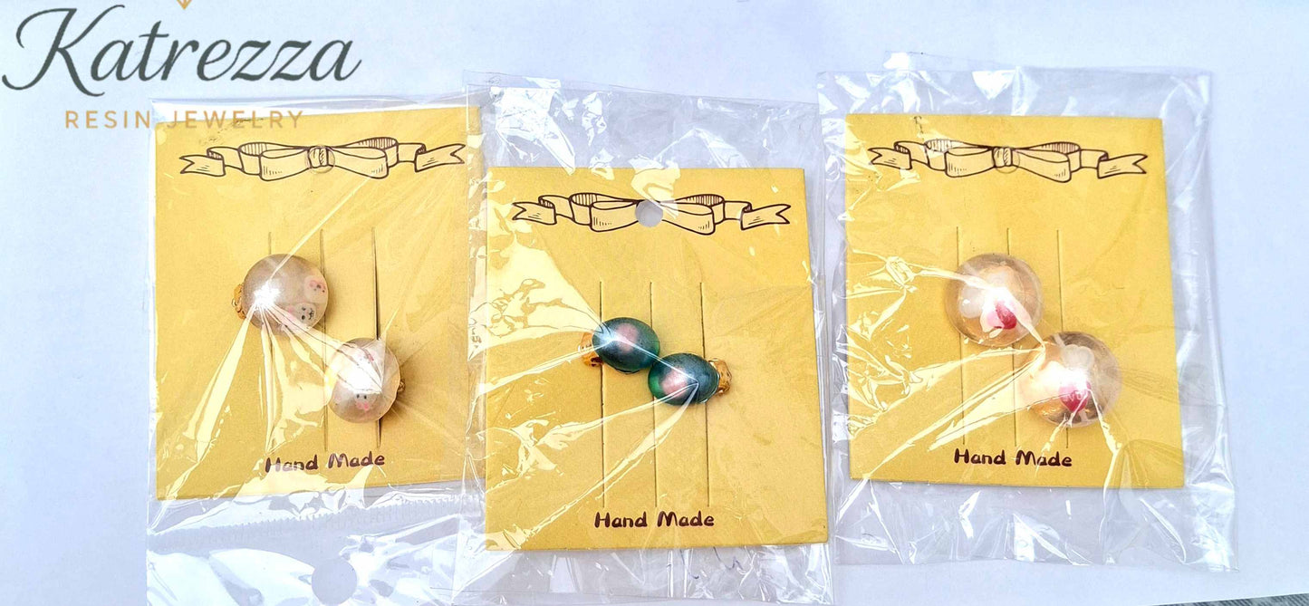 “Cute resin clip-on earrings for kids with bear and cup design – handmade by Katrezza.”