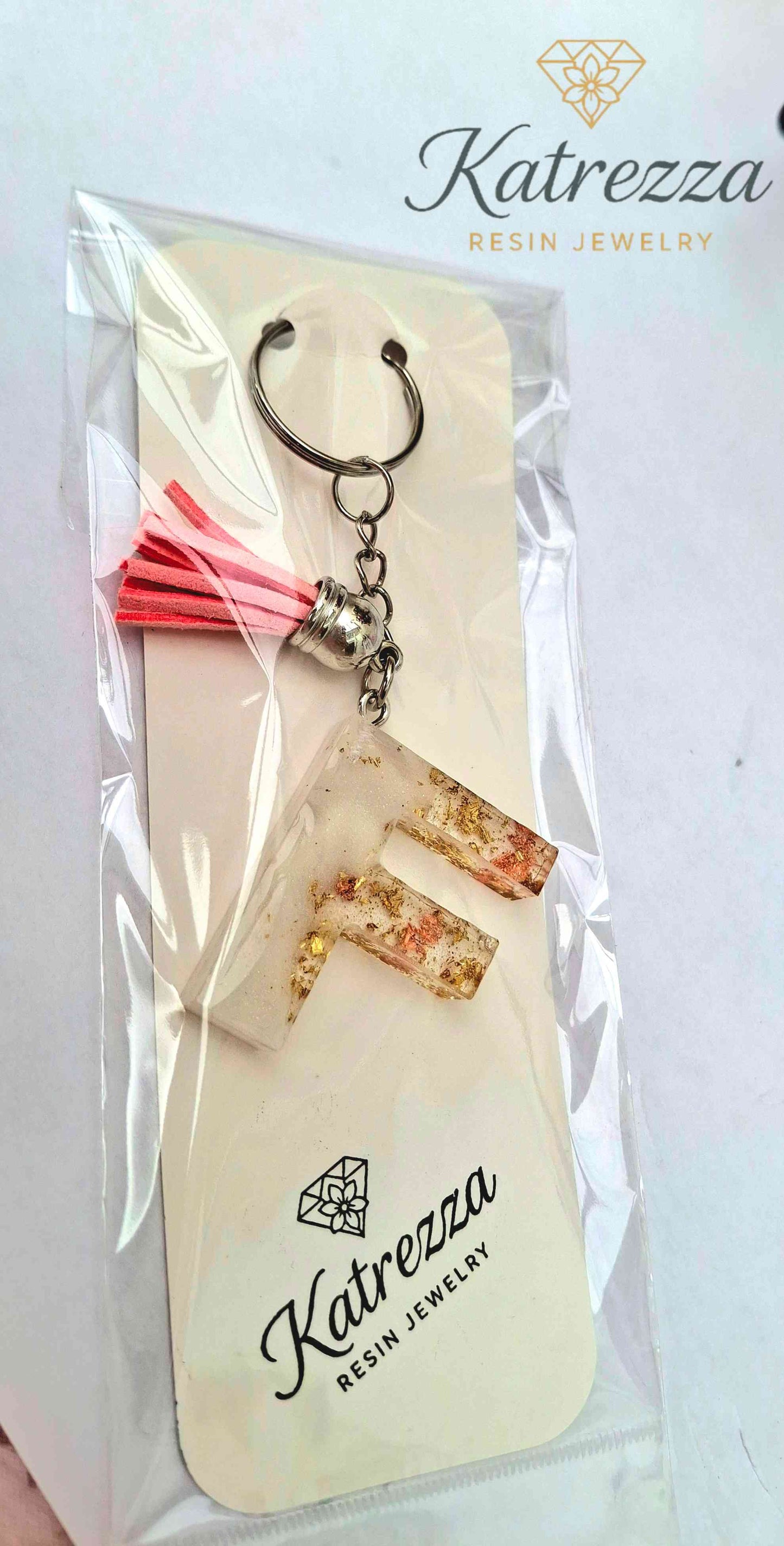 Handmade Resin Initial Keychain – Letter "F" with Gold Flakes & Pink Tassel
