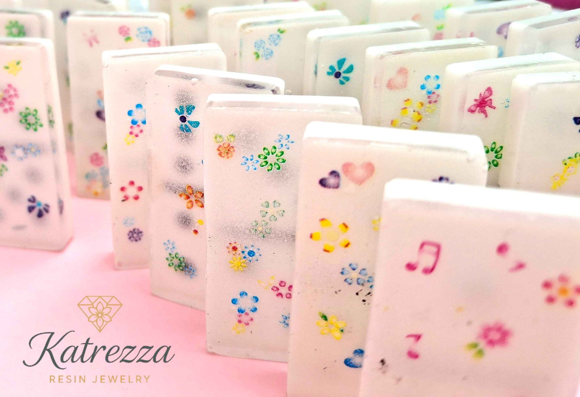 Decorative resin dominoes with colorful embedded flowers