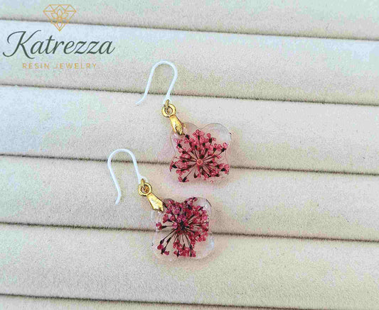 Hypoallergenic resin earrings with pink blossoms and silicone hooks

