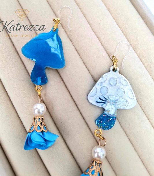 "Back view of glossy double-sided blue resin mushroom earring with pearl bead charm – Katrezza Jewelry"
