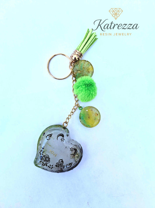 Handmade resin heart keychain with tassel, green pom, and gold-flake resin discs – Katrezza Jewelry

