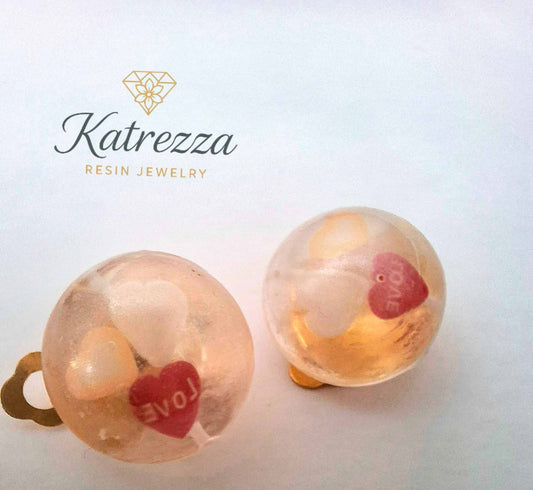 Kids resin clip-on earring with red heart and white heart details – Katrezza jewellery.”